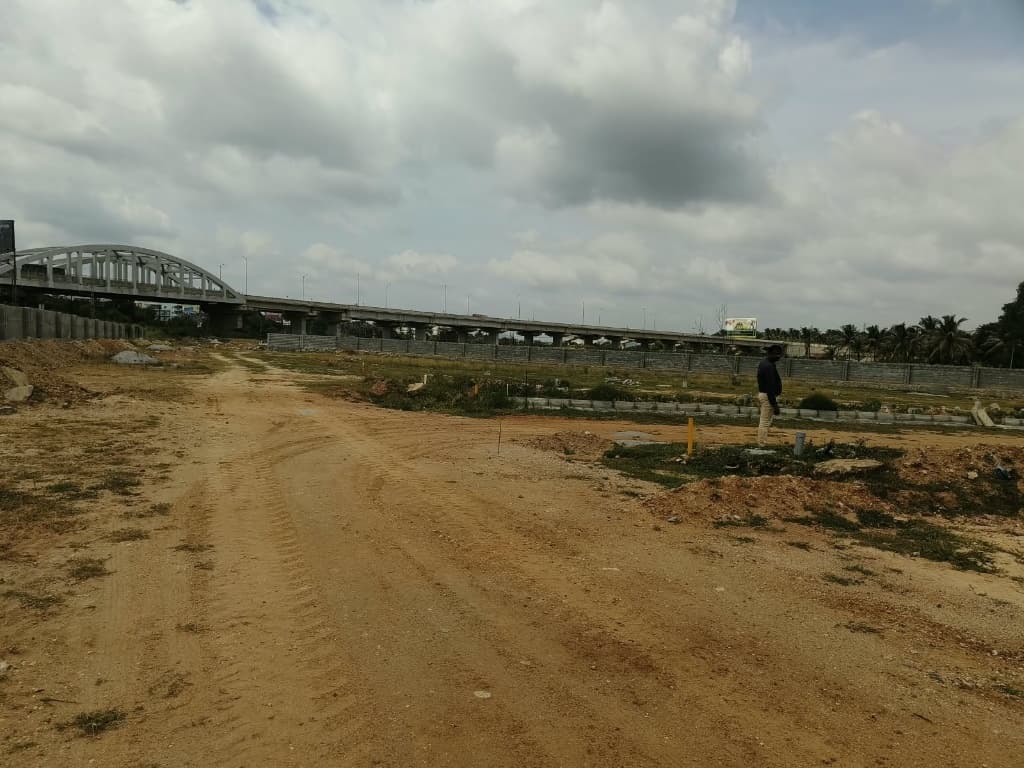 Suma Residency adjacent to Bengaluru–Mysuru Expressway elevated flyover